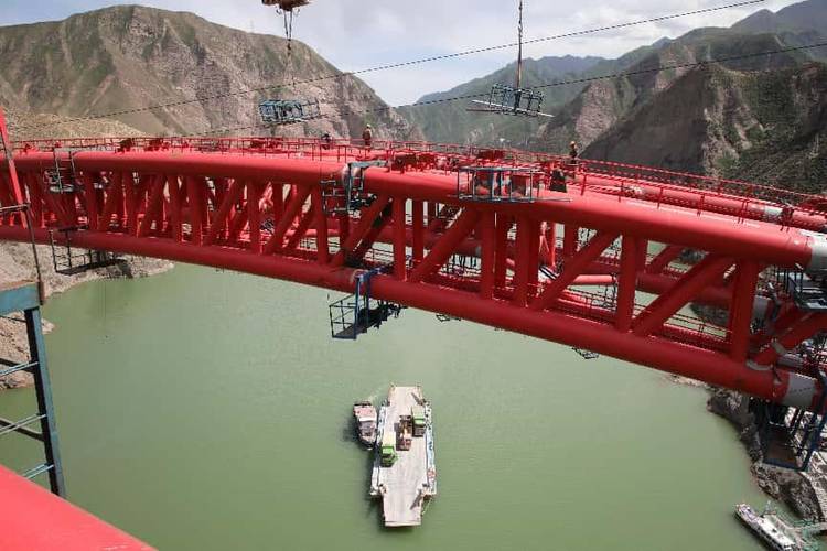 青海交控:积石峡黄河特大桥双幅钢管拱肋合龙