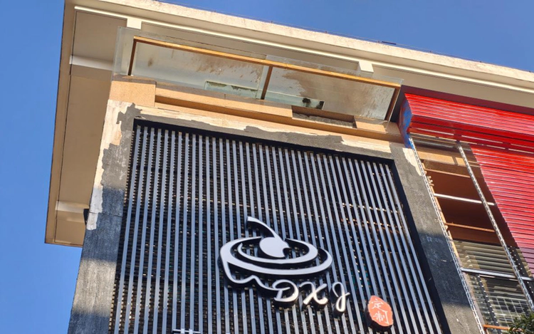 周路口街道金家弄社区:修缮“危墙”除隐患 美化环境助营商